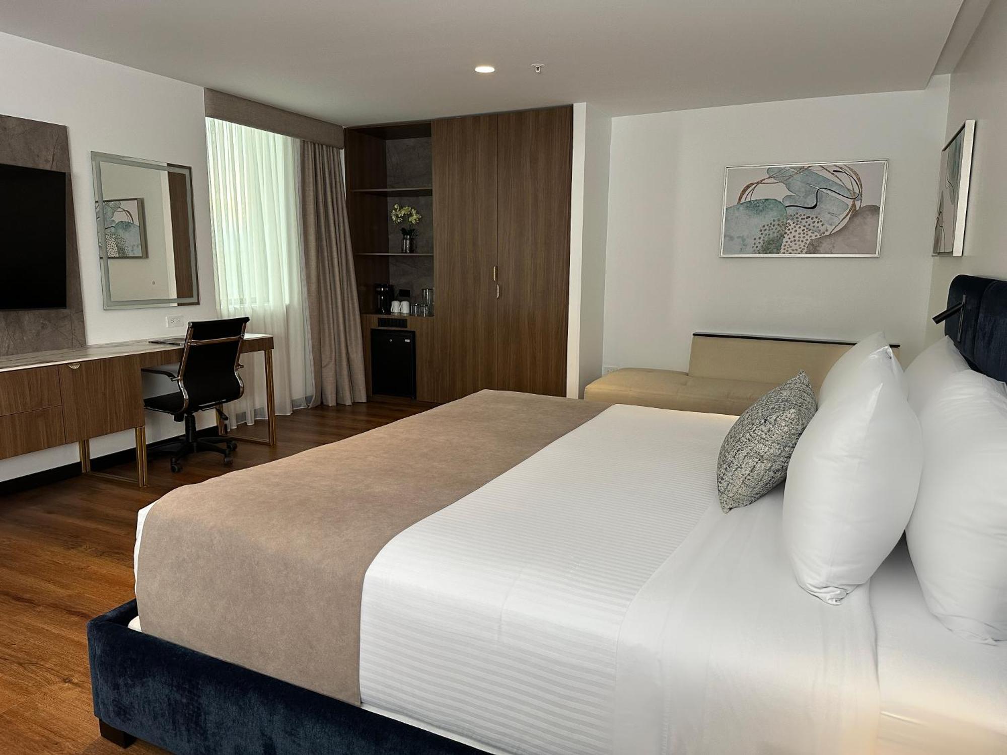 Wyndham Quito Airport Hotell Puembo Exteriör bild A room at the hotel
